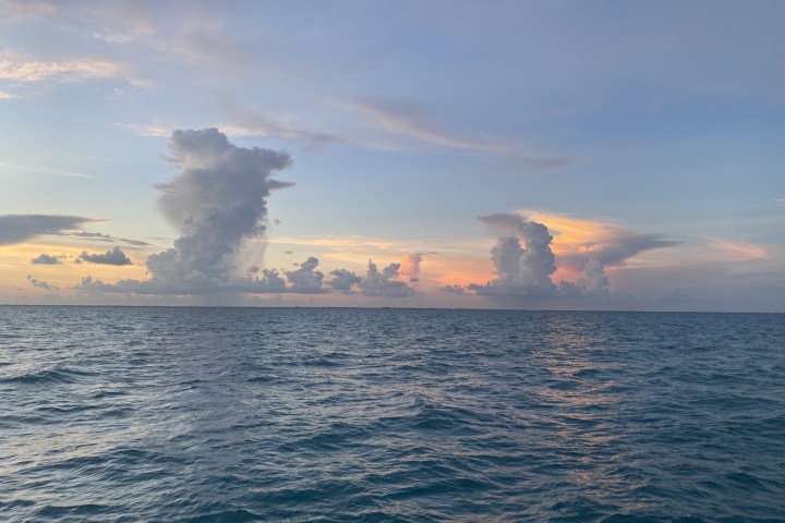 clouds in the sky over a body of water